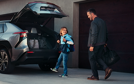 a family packs up for school in a toyota suv