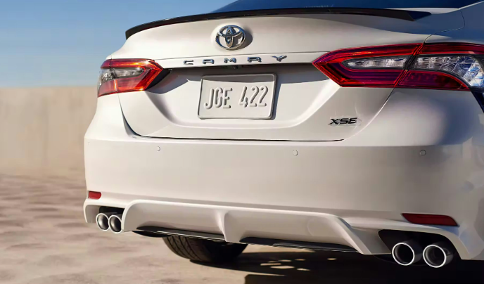 The back of a Toyota Camry XSE against a desert landscape